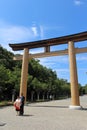 Japanese family taking photo in front of Entrance torii gate of Kashihara Jingu Temple Royalty Free Stock Photo