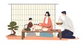 Japanese famlily having dinner together: parents and kid sitting on floor at table with asian food