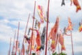 Japanese fish kite on sky, blurred photo background. Koi kite in air. Traditional children day. Carp windsock in sky Royalty Free Stock Photo