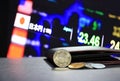 Japanese five hundred Yen coins on obverse JPY and pile of other Japanese coins on black floor with black wallet. Royalty Free Stock Photo