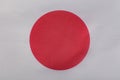 Japanese flag closeup. National symbols of Japan. Land of the rising sun Royalty Free Stock Photo