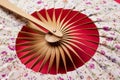 Korean folding fan on red background Royalty Free Stock Photo