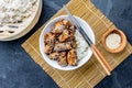 Japanese food. Chicken teriyaki with rice. slate background, top view Royalty Free Stock Photo