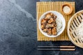 Japanese food. Chicken teriyaki with rice. slate background, top view Royalty Free Stock Photo