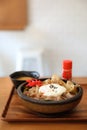 Japanese food Gyudon Japanese beef on rice bowl topped with egg on wooden tray