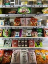 Japanese food in packages on the shelves in the supermarket