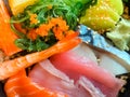 Japanese food sashimi. Mixed sliced raw fish set. Salmon fish, Tuna fish, Saba fish, Salmon roe, Crab sticks, Tamago sushi.