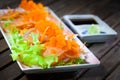 Japanese food Sashimi salmon with wasabi on wooden table Royalty Free Stock Photo