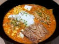 Japanese food style, Top view of ramen with  chashu pork, soft boiled egg, hot and Sour Soup sprinkled with scallion Royalty Free Stock Photo