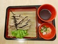 Japanese food style, Top view of soba noodle topped with crispy seaweed and soup.