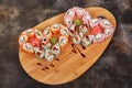 Japanese food sushi maki rolls on wooden board, heart shape Royalty Free Stock Photo