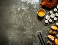 Japanese food. Sushi rolls and a Cup of tea. Royalty Free Stock Photo