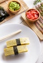 Japanese food tamago nigiri sushi on white plate