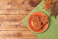 Japanese food, traditional maple leaf cake dessert on wooden background. Royalty Free Stock Photo