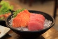 Japanese foods, fresh salmon and tuna sashimi sliced served on ice Royalty Free Stock Photo