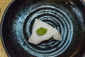 Japanese fresh raw seafood Swordfish Sashimi in black plate