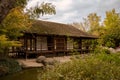 Japanese garden in Toulouse with a house and green trees on both sides Royalty Free Stock Photo