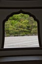 The Japanese garden view in the window frame. Ginkaku-Ji Temple. Kyoto Japan Royalty Free Stock Photo