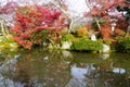 Japanese garden and pond in Eikando temple with autumn red maple leaves and green season in Kyoto, Japan Royalty Free Stock Photo