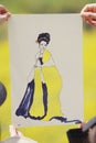 Japanese geisha with a bright yellow and abstract dress