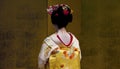 Japanese geisha with a golden background