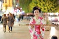 Japanese geisha samurai with sword outside at night Royalty Free Stock Photo