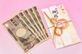 Japanese gift envelope and Ten thousand yen bill. Royalty Free Stock Photo