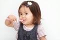 Japanese girl brushing her teeth Royalty Free Stock Photo