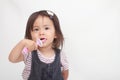 Japanese girl brushing her teeth Royalty Free Stock Photo