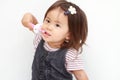 Japanese girl brushing her teeth Royalty Free Stock Photo