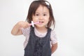 Japanese girl brushing her teeth Royalty Free Stock Photo