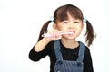 Japanese girl brushing her teeth Royalty Free Stock Photo