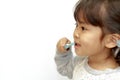 Japanese girl brushing her teeth Royalty Free Stock Photo