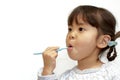 Japanese girl brushing her teeth Royalty Free Stock Photo