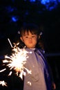 Japanese girl doing handheld fireworks Royalty Free Stock Photo