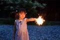 Japanese girl doing handheld fireworks Royalty Free Stock Photo