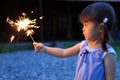 Japanese girl doing handheld fireworks Royalty Free Stock Photo