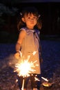 Japanese girl doing handheld fireworks Royalty Free Stock Photo