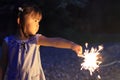 Japanese girl doing handheld fireworks Royalty Free Stock Photo