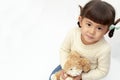 Japanese girl holding a stuffed rabbit