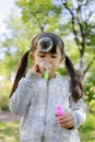Japanese girl playing with bubble in the green Royalty Free Stock Photo