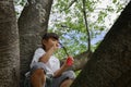 Japanese girl playing with bubble on the tree