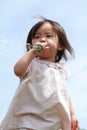 Japanese girl playing with bubble Royalty Free Stock Photo