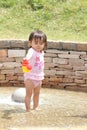 Japanese girl playing with water