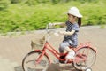 Japanese girl riding on the bicycle