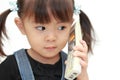 Japanese girl talking on the phone Royalty Free Stock Photo