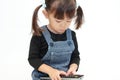 Japanese girl using remote controller Royalty Free Stock Photo