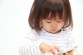 Japanese girl using a smart phone Royalty Free Stock Photo