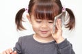 Japanese girl using a smart phone Royalty Free Stock Photo