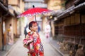 Japanese girl walk in kyoto old market Royalty Free Stock Photo